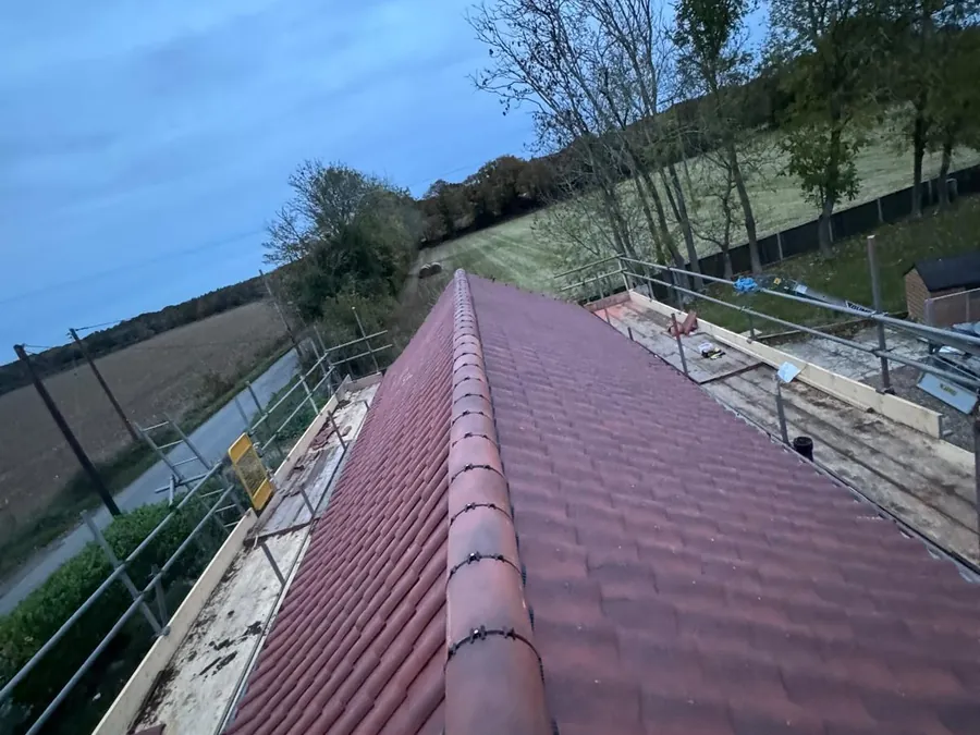 Clean, restored tiled roof by Big Red Roofing